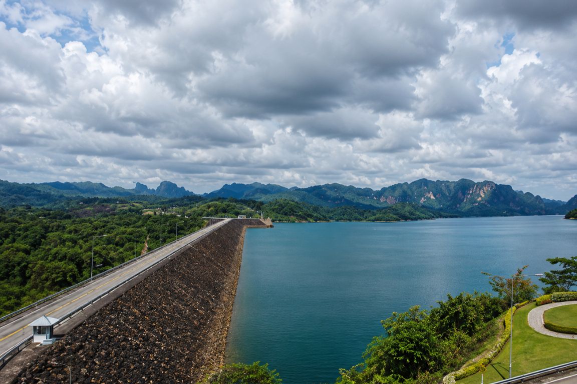 Ratchaprapha Dam overlooking Cheow Lan Lake in Khao Sok National Park during a sightseeing tour with our agency